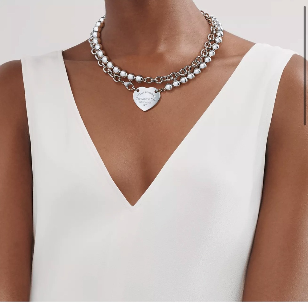 Tiffany necklace been wore a handful of times.